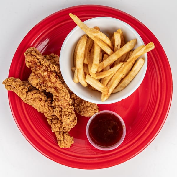 Cheers Sports Eatery chicken tenders and fries with dipping sauce on a red plate.